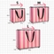 リターン ギフトのためのPantoneピンクの縞で飾られたCMYKの化粧品の紙袋
